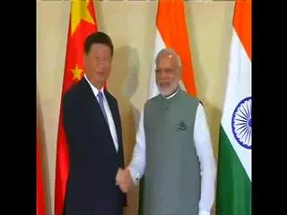 PM Modi Meets Chinese President Xi Jinping, - Sakshi