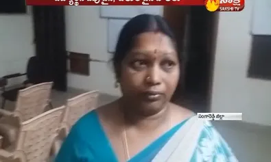 lady teacher beating with stick - Sakshi