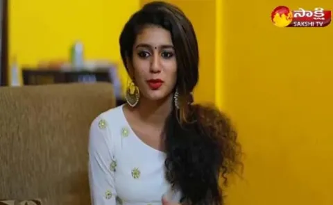 Supreme Court stayed all the cases pending against Priya Varrier  - Sakshi