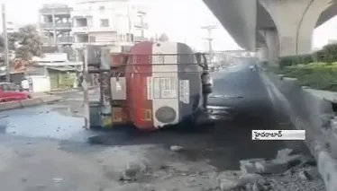 Fuel tanker loses control, overturns near Hyderabad - Sakshi