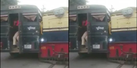 A railway line passing through a busy street in Madhya Pradesh - Sakshi