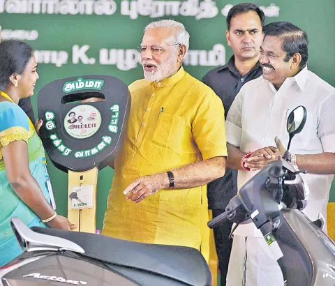 PM Modi Launches Amma Two-wheeler Scheme in Chennai on Jayalalithaa's 70th Birthday - Sakshi