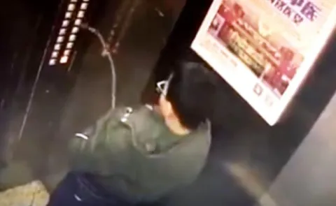 Boy pees on elevator buttons, gets stuck - Sakshi