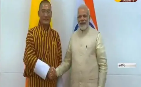 Prime Minister Modi met with Bhutan prime minister - Sakshi