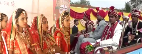 100 couples tied knot in a mass marriage in Gujarat - Sakshi