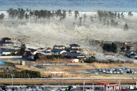 Japan marks 7 years since earthquake, tsunami and nuclear disaster - Sakshi