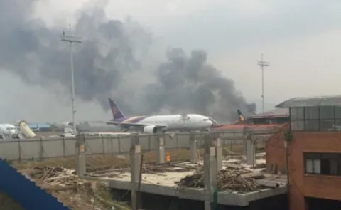 US-Bangla Airline plane crashes at Nepal's Kathmandu Tribhuvan International Airport - Sakshi