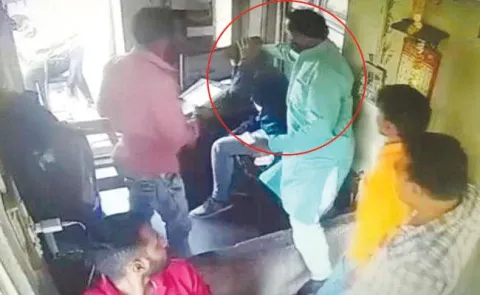 BJP MLA Kicks And Slaps Toll Gate Worker In Rajasthan - Sakshi