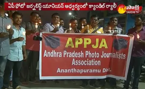 Special status: AP Photojournalist union Candle Rally - Sakshi