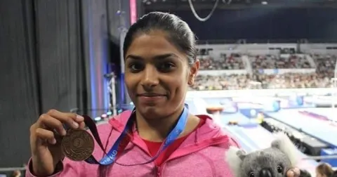 Gymnastics World Cup bronze medallist Aruna Reddy gets a champion’s welcome - Sakshi