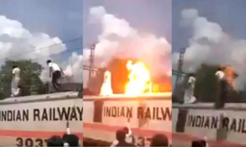 PMK Activist Atop A Train Engine Gets Electric Shock - Sakshi