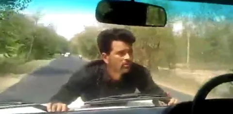 UP man clings to BDO car's bonnet for 4 km - Sakshi