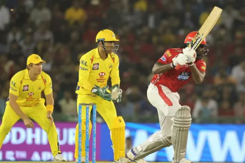 Punjab hold on to win by four runs despite MS Dhoni heroics - Sakshi