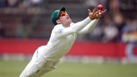 Dean Elgars Super catch ends Tim Paine innings - Sakshi