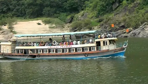 fire accident in boat - Sakshi