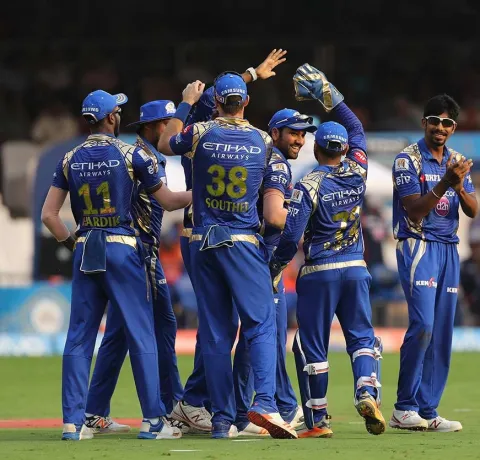 MI alive in playoffs race - Sakshi