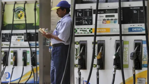 Government should review taxes on petrol, diesel - Sakshi