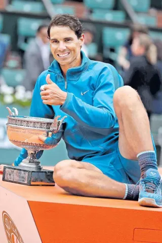 Rafael Nadal claims record extending 11th French Open title  - Sakshi