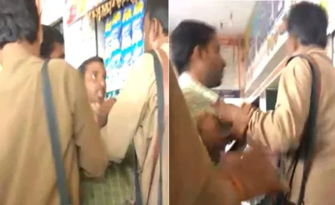 Conductor Beats Youth In Wanaparthy video goes viral - Sakshi