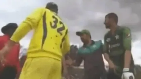 Glenn Maxwell snubbed the Pakistan Captain Sarfaraz Ahmed’s handshake - Sakshi