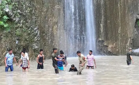Seven killed, 34 injured as boulder falls on tourists in  waterfall in Jammu - Sakshi