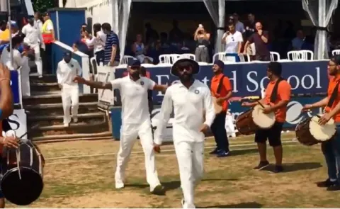 Viral video-Virat Kohli Enter the Ground in Style Against Essex  - Sakshi