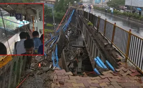 Heavy rains in Mumbai,Part of bridge collapses, train services affected - Sakshi