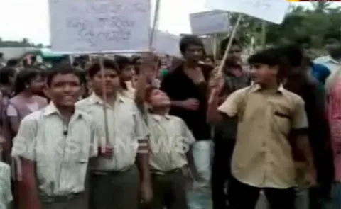 Students are protest in front of Narsapuram Bus Stand - Sakshi