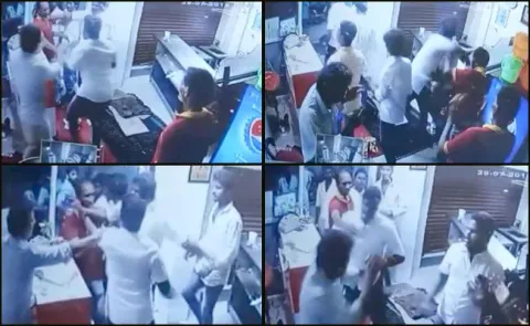 DMK Workers thrashed Hotel staff in Chennai video goes viral - Sakshi