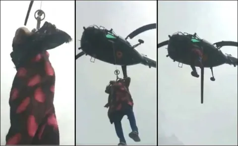 Navy Chopper Rescues Pregnant Woman From Flood - Sakshi