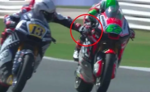Motorbike racer Romano Fenati sacked after grabbing rivals brake during race - Sakshi
