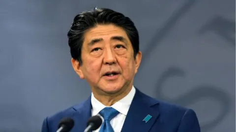 Shinzo Abe set to be Japans longest-serving PM after winning party vote - Sakshi