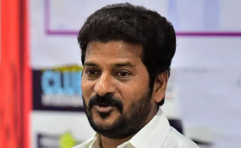 I-T raid at Congress leader Revanth Reddys house in Hyderabad - Sakshi