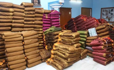 Telangana EC no to Bathukamma saree scheme - Sakshi