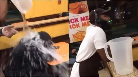 Dunkin Donuts employee fired after viral video shows him pouring water on sleeping homeless man - Sakshi