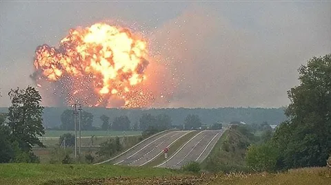 Thousands evacuated after explosions at Ukrainian ammo depot - Sakshi