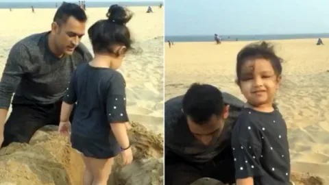 Video Of MS Dhoni And Ziva Playing In The Sand - Sakshi