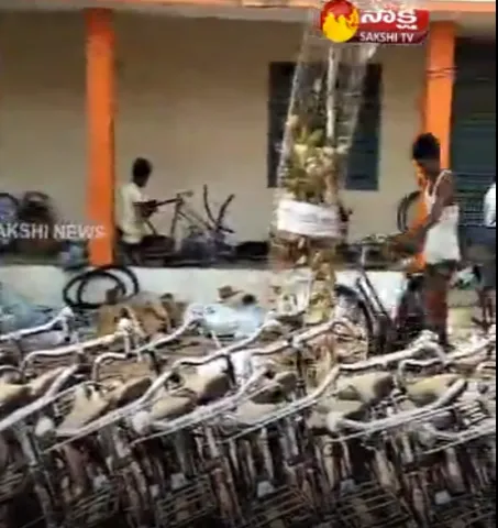 TDP Bicycle Distribution in Vijayawada - Sakshi