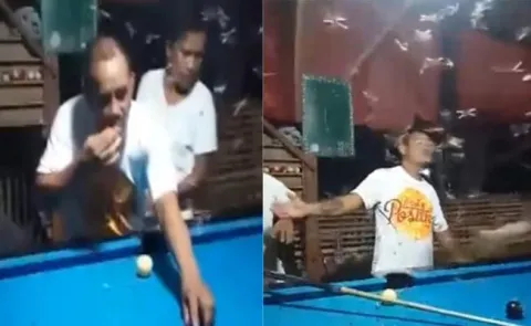 Barman eating flying ants in Philippines
