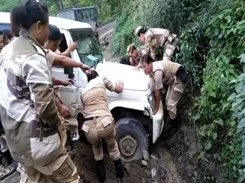 Nagaland Woman Battalion Pushes Car Out Of Ditch
