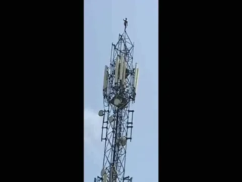  Youth Climbs Cellphone Tower For Prabhas in Janagam