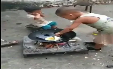 Watch, Toddler Cooks Indonesian Fried Rice For His Little Sister  - Sakshi