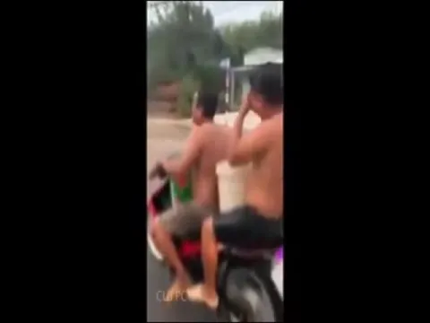 Bizarre Video Two Men Take A Bath During Bike Ride - Sakshi