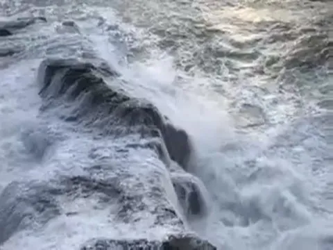 Horrifying Video Shows Huge Wave Sweep Beachgoer Into Ocean 