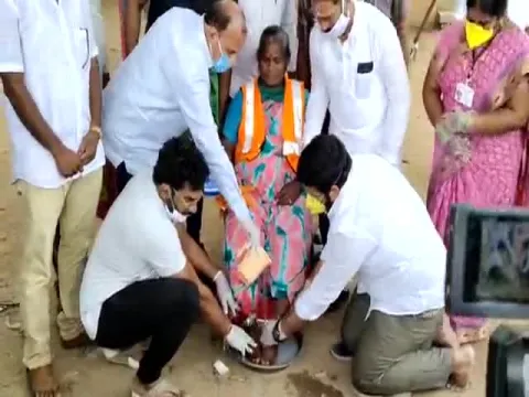 YSRCP MLA Jakkampudi Raja Legs washed to a sanitary worker