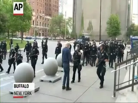 New York police shove man violently as curfew begins