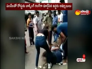 Two Young Women Fighting  For One Young Man