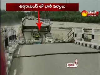 Dehradun Rishikesh Bridge Collapses Road Caves Heavy Rainfall