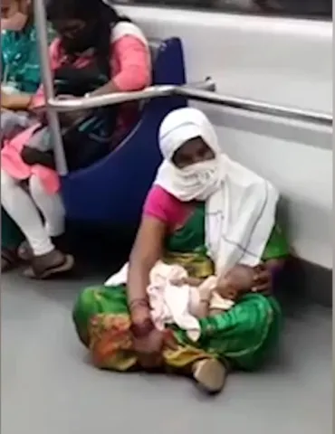 Hyderabad Metro Rail Woman Sits On The Floor By Carrying Child Video Viral