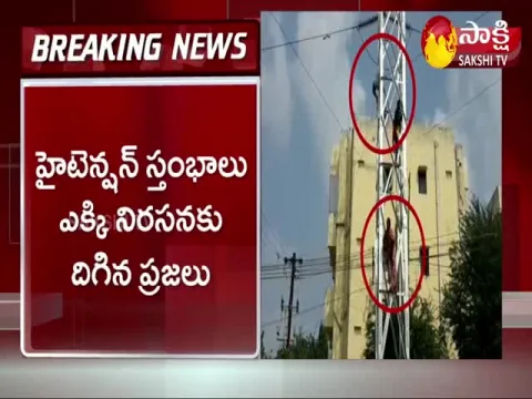 Tirumalagiri Local People Protest Climbs Electric Pole